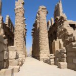 Entrance pylon of the Precinct of Amun-Re at Karnak Temple Complex, Luxor, Egypt, with an avenue of sphinxes.