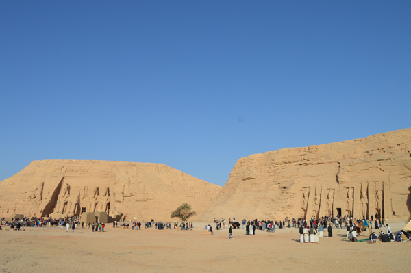 The Abu Simbel Temples in southern Egypt, with four colossal seated statues of Pharaoh Ramesses II carved into the rock façade.
