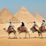 Daytime photo to the Pyramids of Khufu,Khafre,and Menkaure on the Giza Plateau near Cairo,Egypt