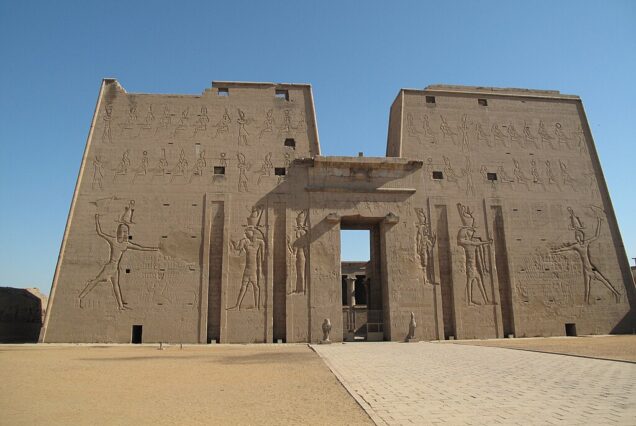 "Temple of Edfu in Egypt, dedicated to Horus, showcasing well-preserved Ptolemaic architecture and inscriptions."